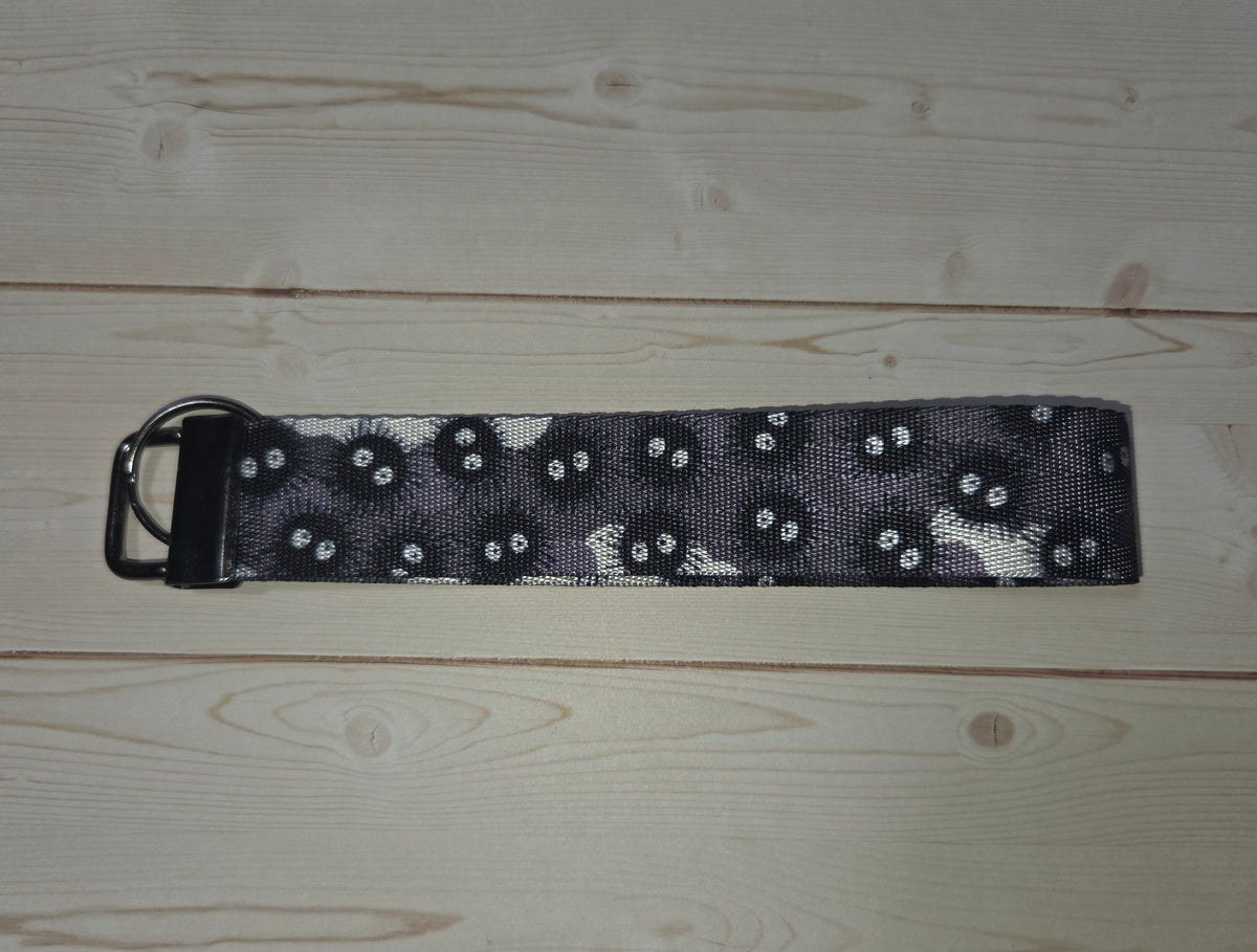 Dust Ball Wrist Strap